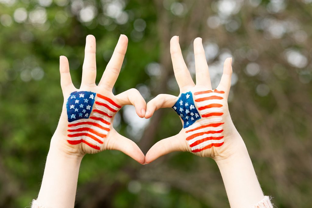 hild hands painted with american flag
